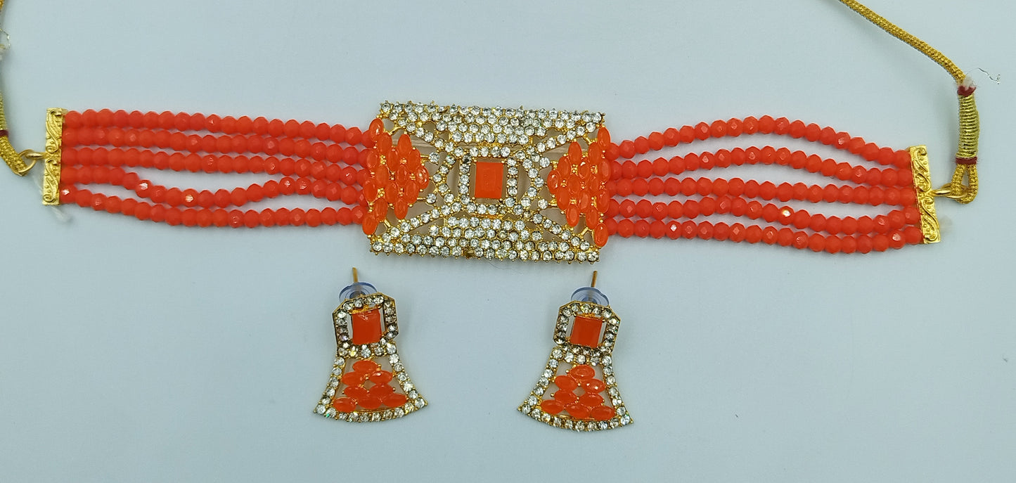 UNIQUE ORANGE KUNDAN CHOKER AND EARRING SET