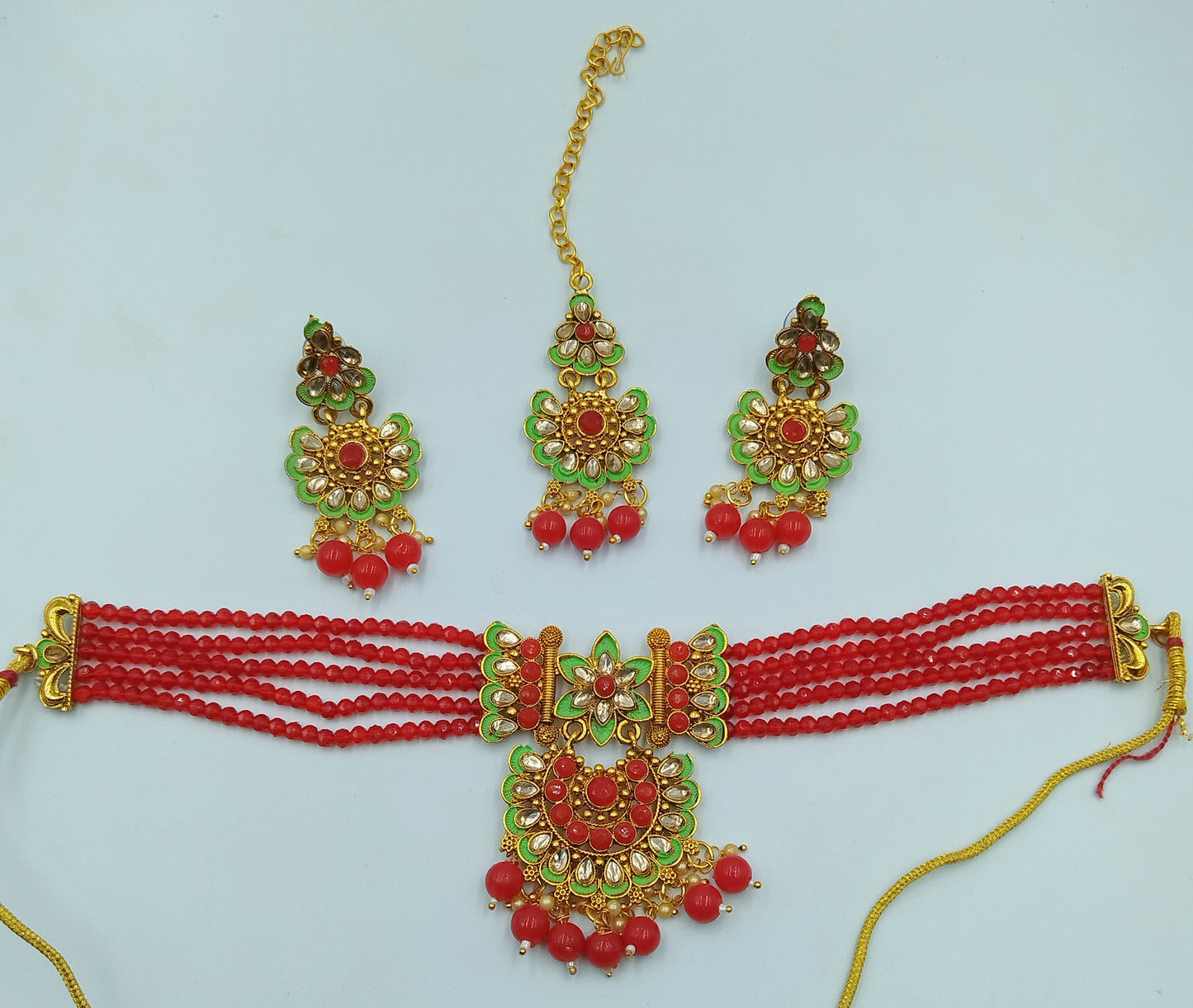 BEAUTIFUL RED, GREEN AND GOLD KUNDAN CHOKER, MAANG TIKKA AND EARRING SET