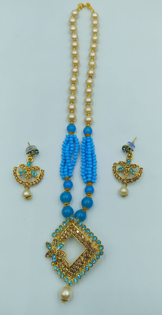 BEAUTIFUL BABY BLUE  AND GOLD NECKLACE AND EARRING SET